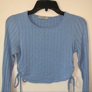 This is a baby blue crop top